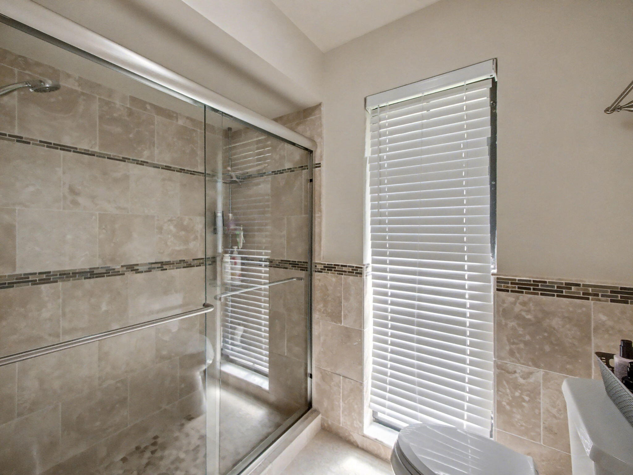 720 Muirfield Circle Atlantis, FL 33462 - Photo 8 of 20 a bathroom with a shower