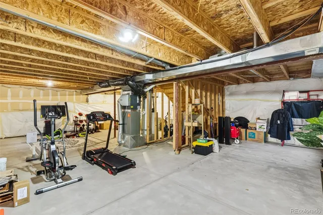a view of a backyard with chairs