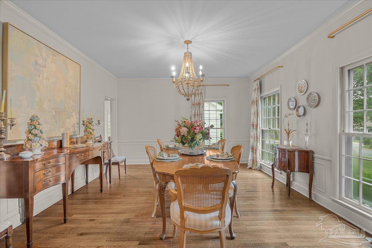 3361 Palermo Road Pensacola, FL 32503 - Photo 25 of 50 a view of a dining room with furniture window and wooden floor