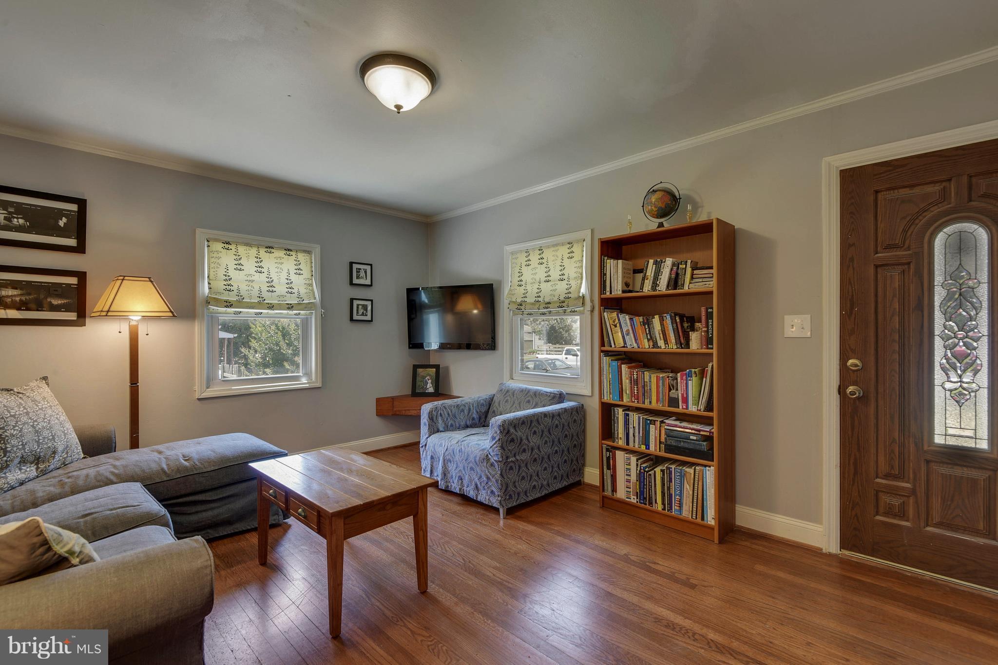 4412 Bennion Road Silver Spring, MD 20906 - Photo 12 of 29 a living room with furniture and a wooden floor