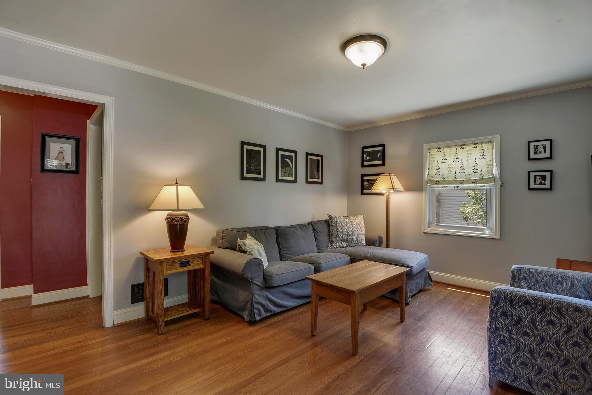 4412 Bennion Road Silver Spring, MD 20906 - Photo 13 of 29 a living room with furniture and a wooden floor