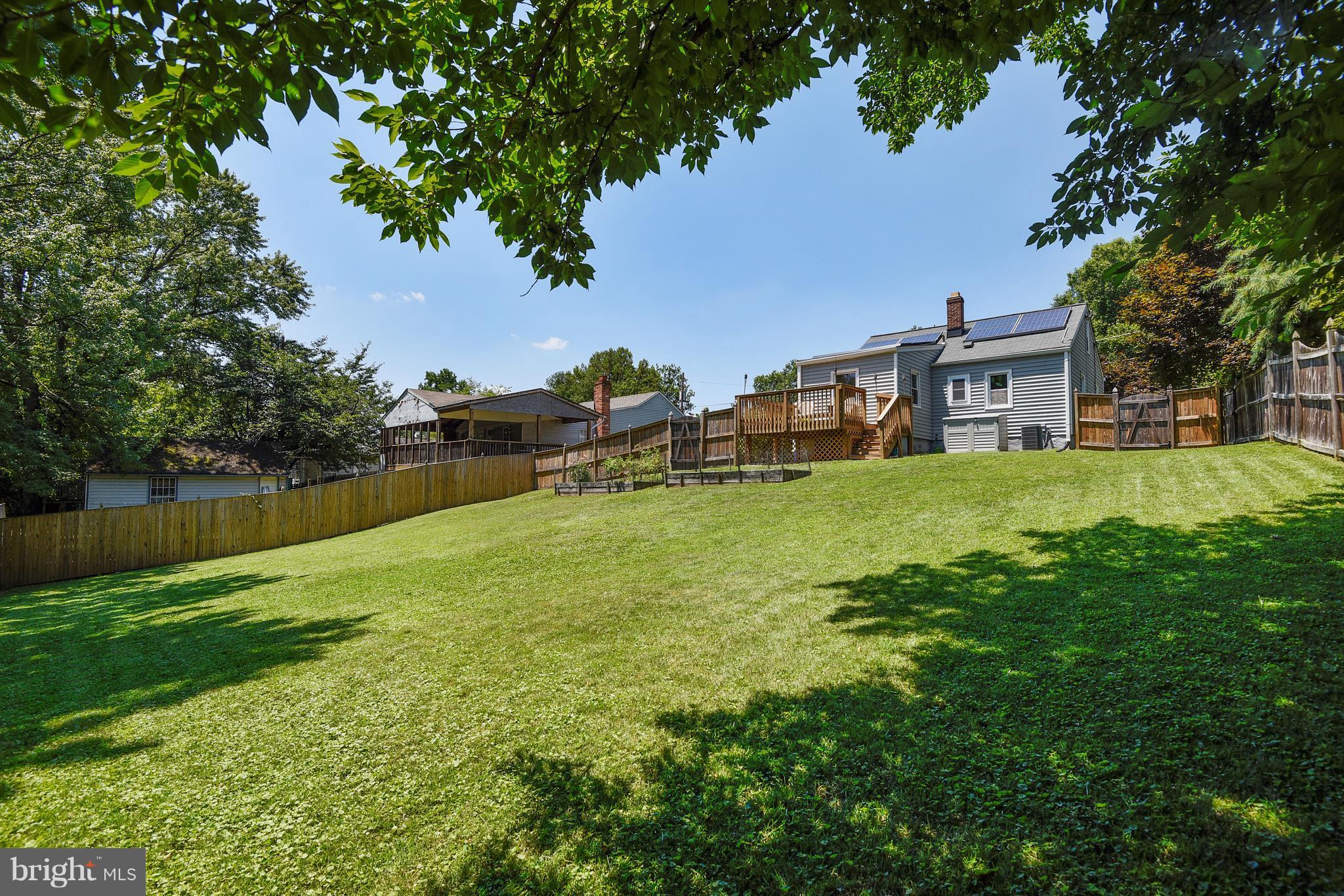 4412 Bennion Road Silver Spring, MD 20906 - Photo 4 of 29 a view of a house with a yard and sitting area