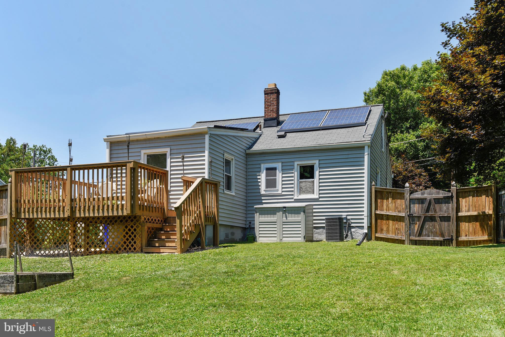 4412 Bennion Road Silver Spring, MD 20906 - Photo 5 of 29 a front view of a house with a yard