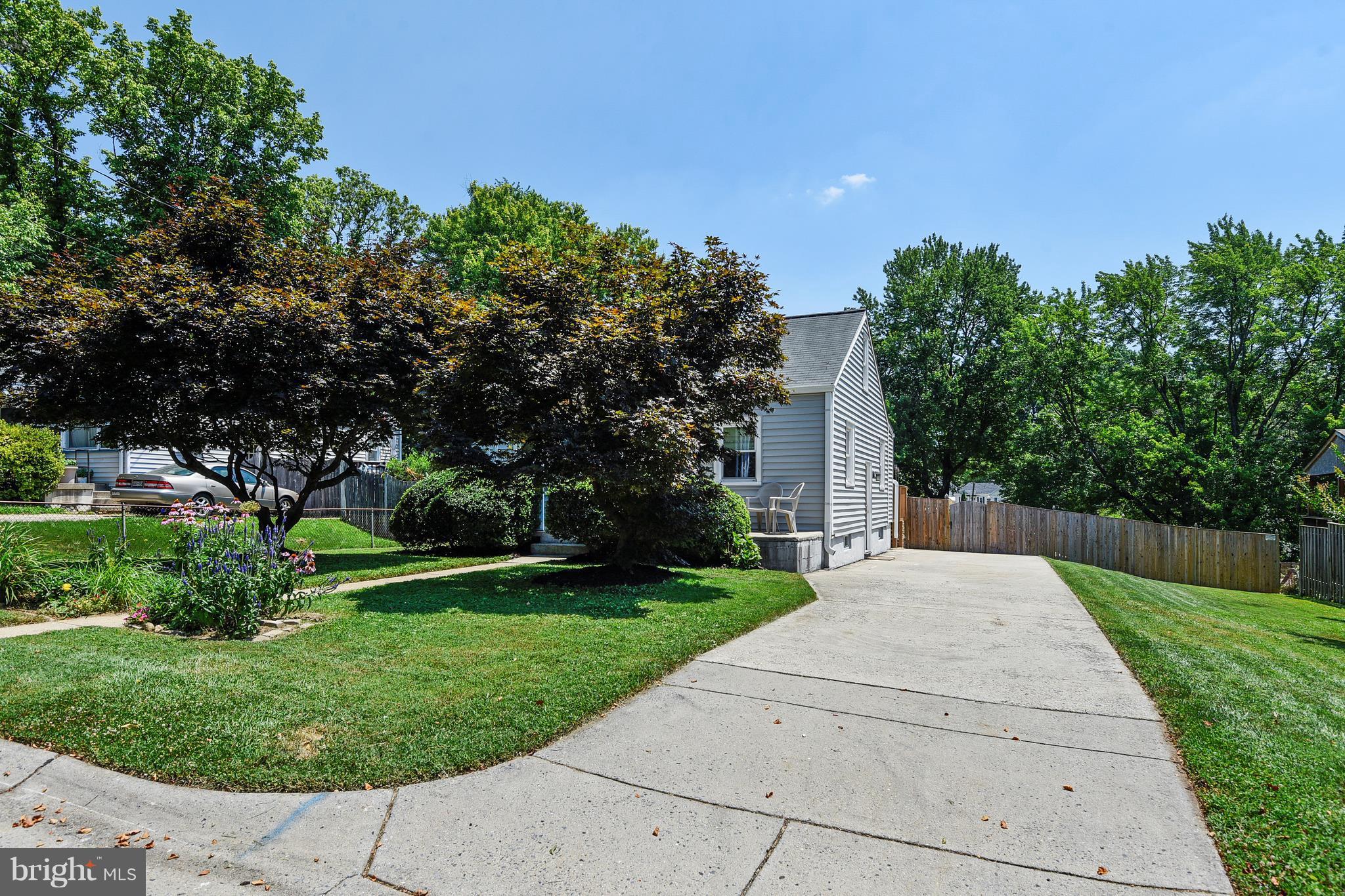 4412 Bennion Road Silver Spring, MD 20906 - Photo 7 of 29 a pathway of a house with a yard