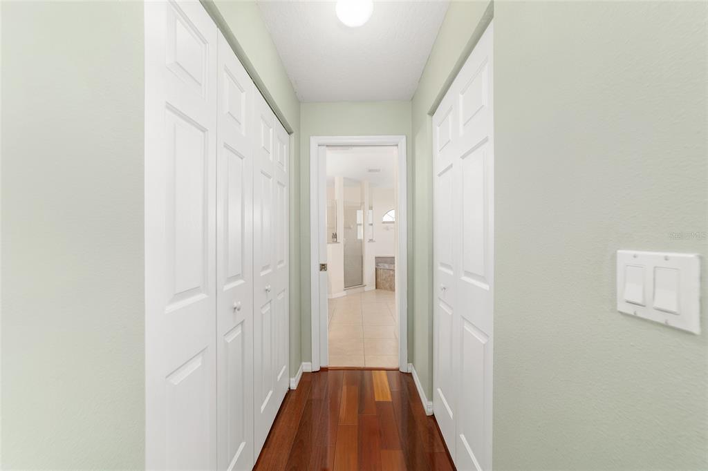 4037 Southeast 40th Street Ocala, FL 34480 - Photo 24 of 38 a view of a hallway with a wooden floor