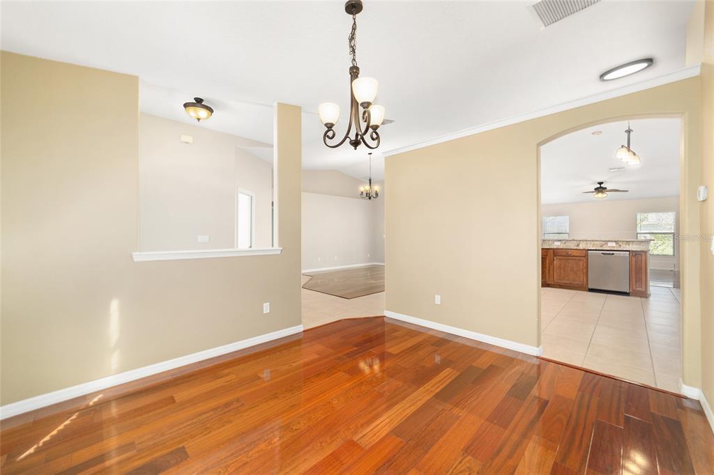 4037 Southeast 40th Street Ocala, FL 34480 - Photo 27 of 38 a view of a room with wooden floor and windows