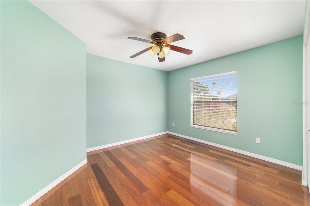 4037 Southeast 40th Street Ocala, FL 34480 - Photo 31 of 38 a view of a room with a ceiling fan and window