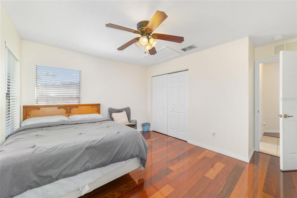 4037 Southeast 40th Street Ocala, FL 34480 - Photo 33 of 38 a bedroom with a bed and a window