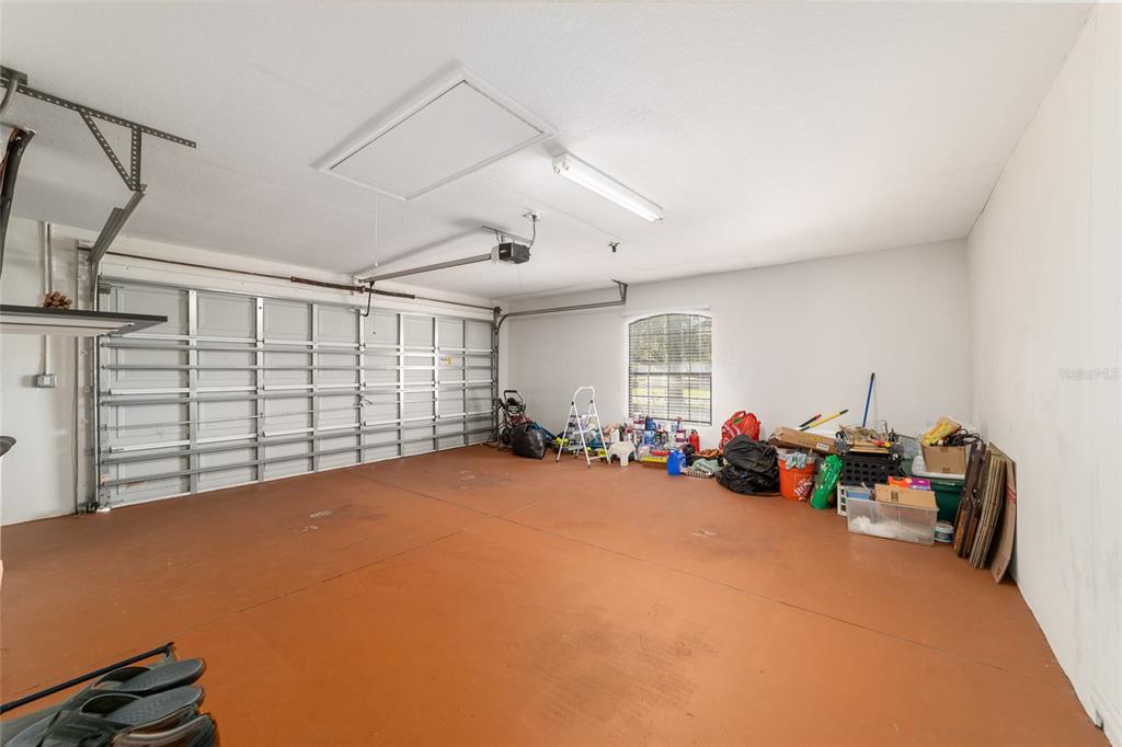 4037 Southeast 40th Street Ocala, FL 34480 - Photo 35 of 38 a view of a livingroom with toys and a projector