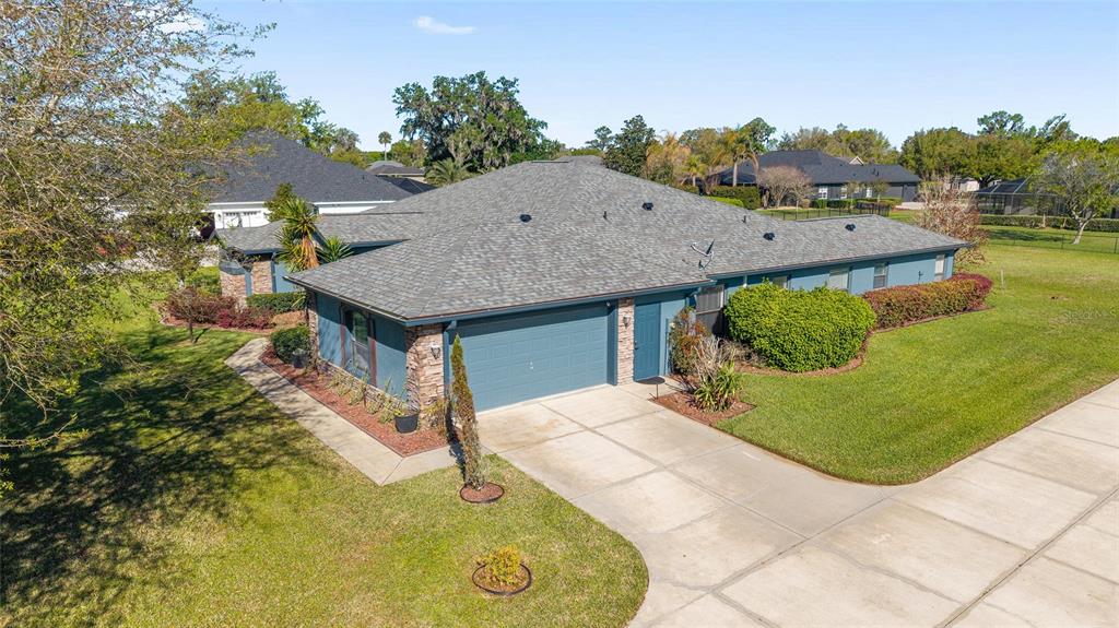 4037 Southeast 40th Street Ocala, FL 34480 - Photo 5 of 38 a aerial view of a house with a yard