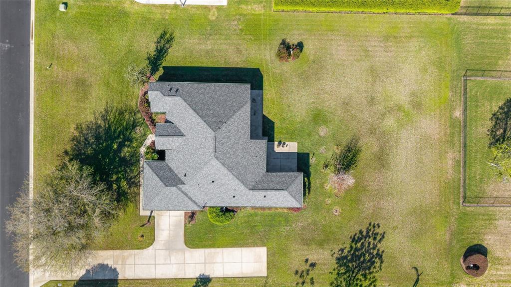 4037 Southeast 40th Street Ocala, FL 34480 - Photo 6 of 38 an aerial view of residential house with pool and yard