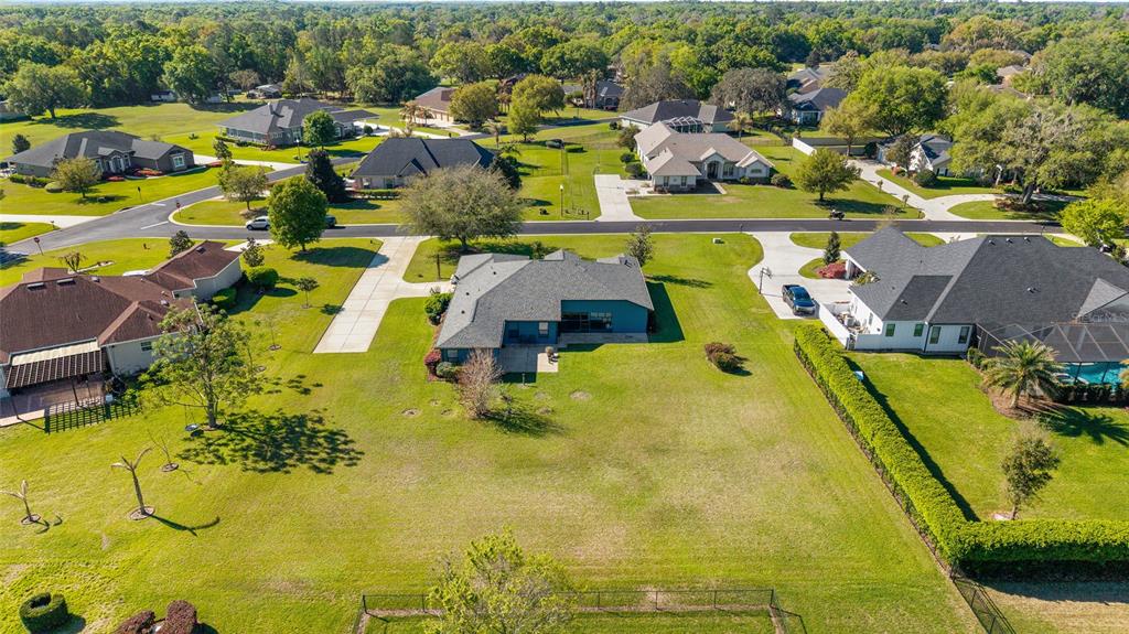 4037 Southeast 40th Street Ocala, FL 34480 - Photo 8 of 38 a view of a swimming pool with outdoor seating and city view