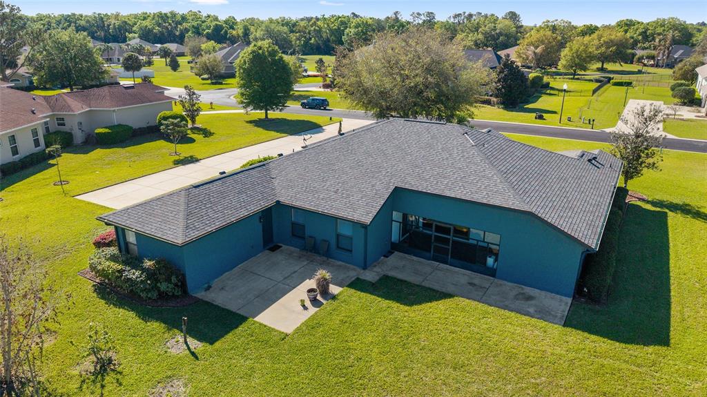 4037 Southeast 40th Street Ocala, FL 34480 - Photo 9 of 38 an aerial view of a house with yard swimming pool and outdoor seating