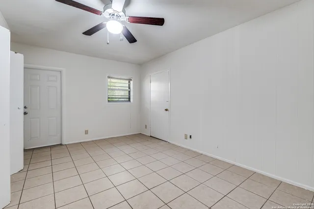 a house with trees in the background