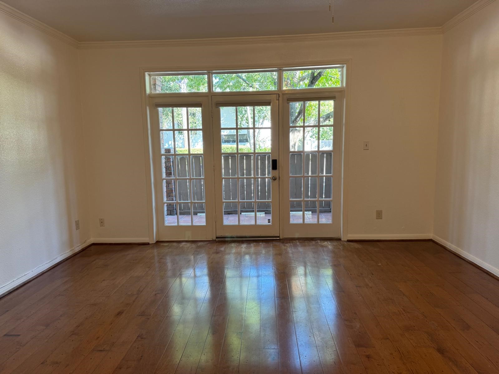 2425 Underwood Street, Unit 142 Houston, TX 77030 - Photo 14 of 38 a view of room with wooden floor and windows
