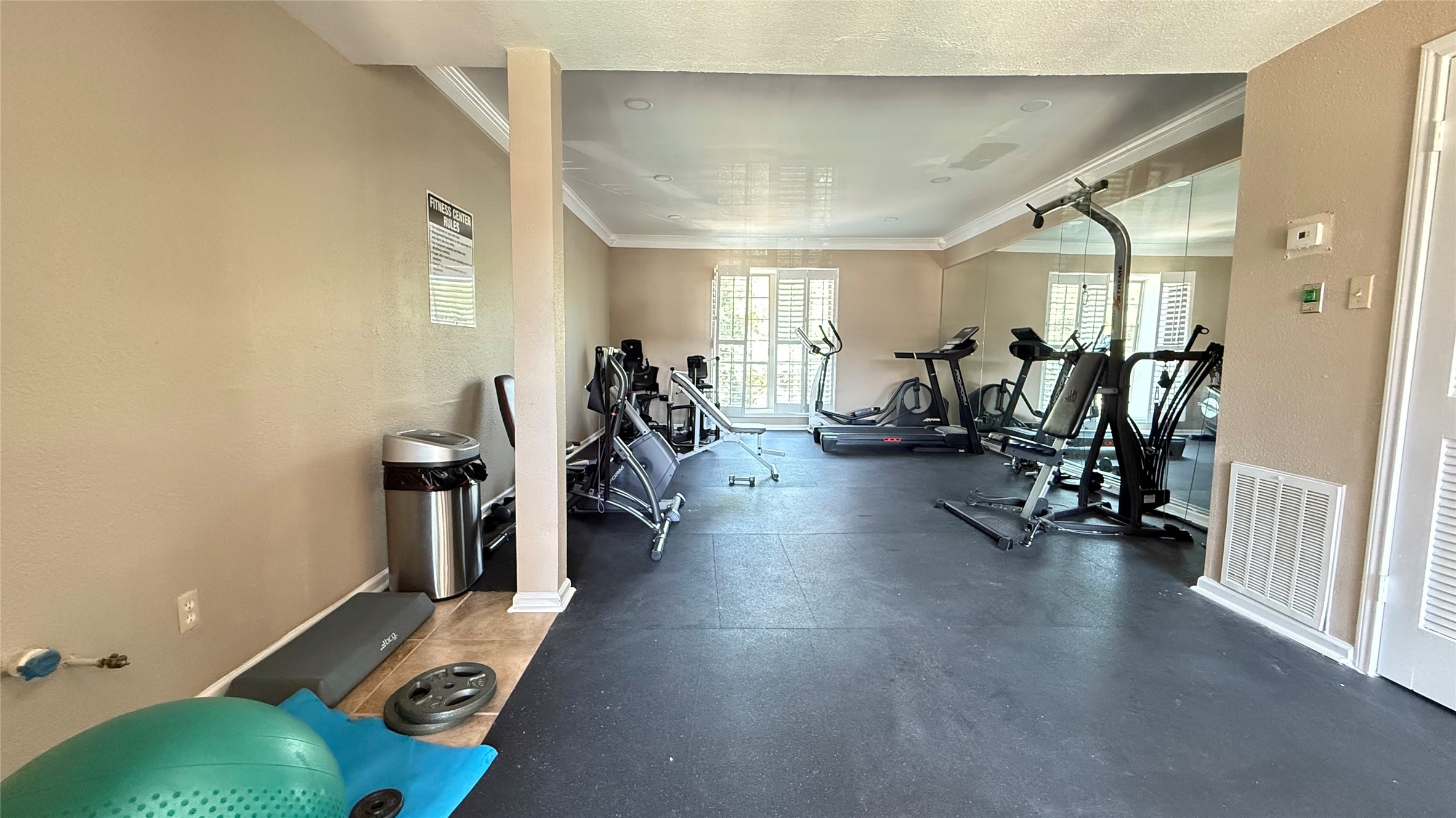 2425 Underwood Street, Unit 142 Houston, TX 77030 - Photo 22 of 38 a view of a room with gym equipment