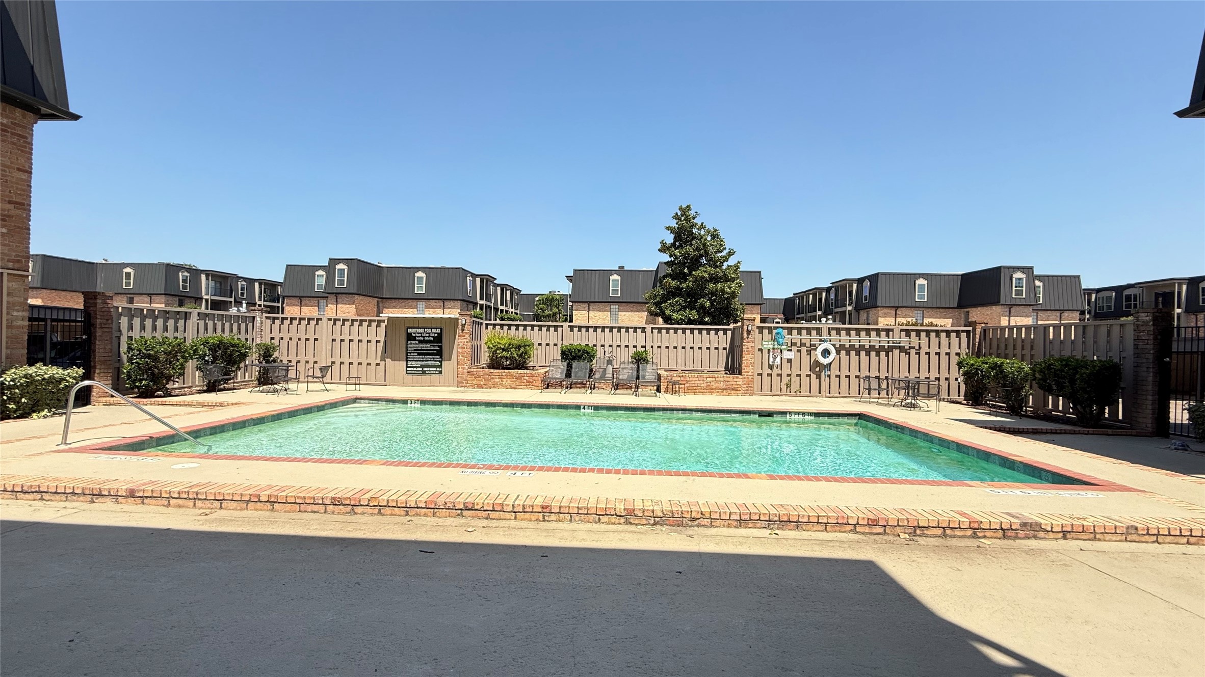 2425 Underwood Street, Unit 142 Houston, TX 77030 - Photo 37 of 38 a house with trees in front of it