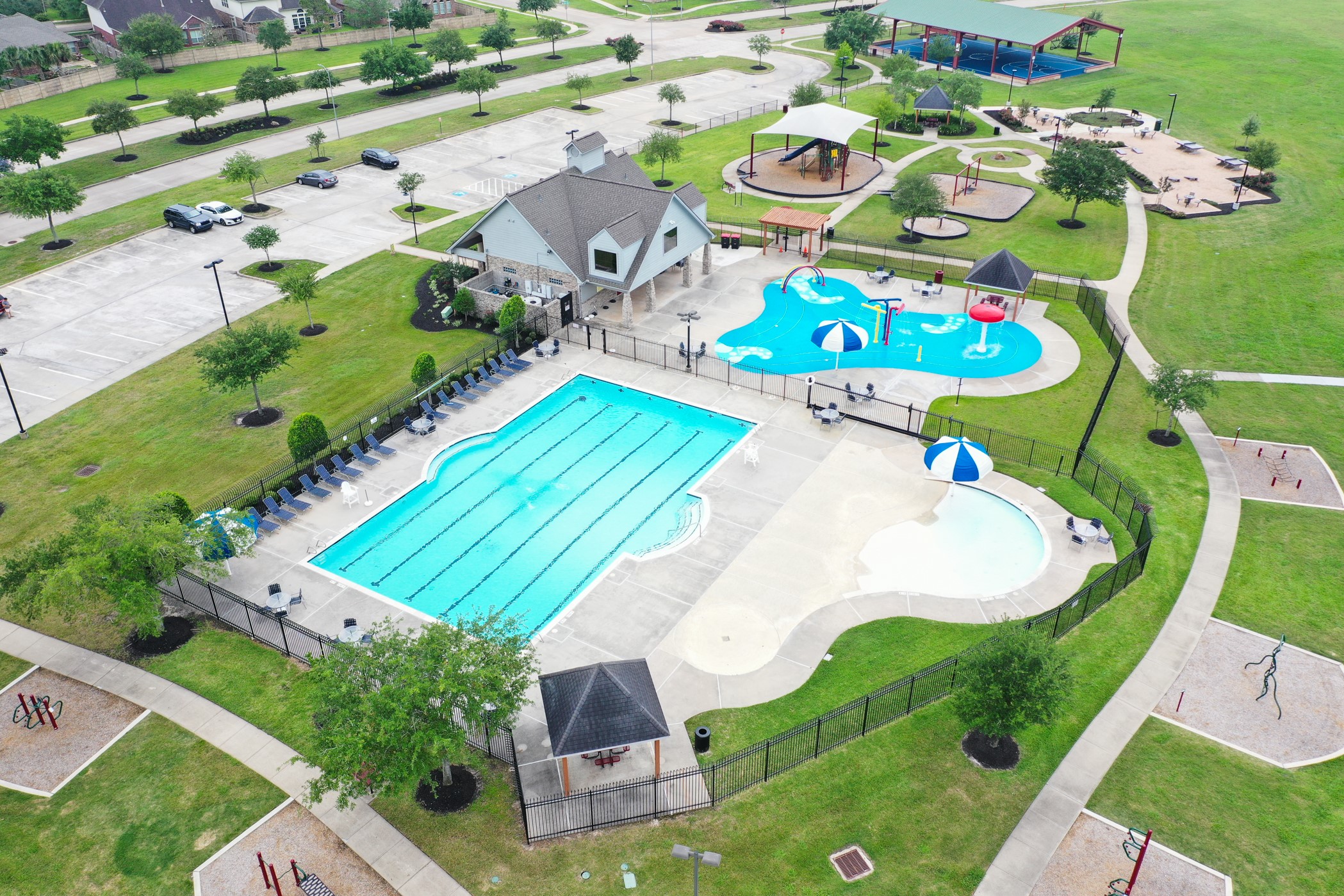 9438 Emerald Lakes Drive Rosharon, TX 77583 - Photo 31 of 36 an aerial view of a play ground and swimming pool
