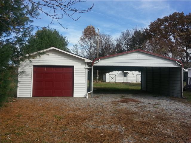 4618 Woodrow Wilson Road Springfield, TN 37172 - Photo 4 of 18 Park in the 1 car detached garage or under the 2-car carport!