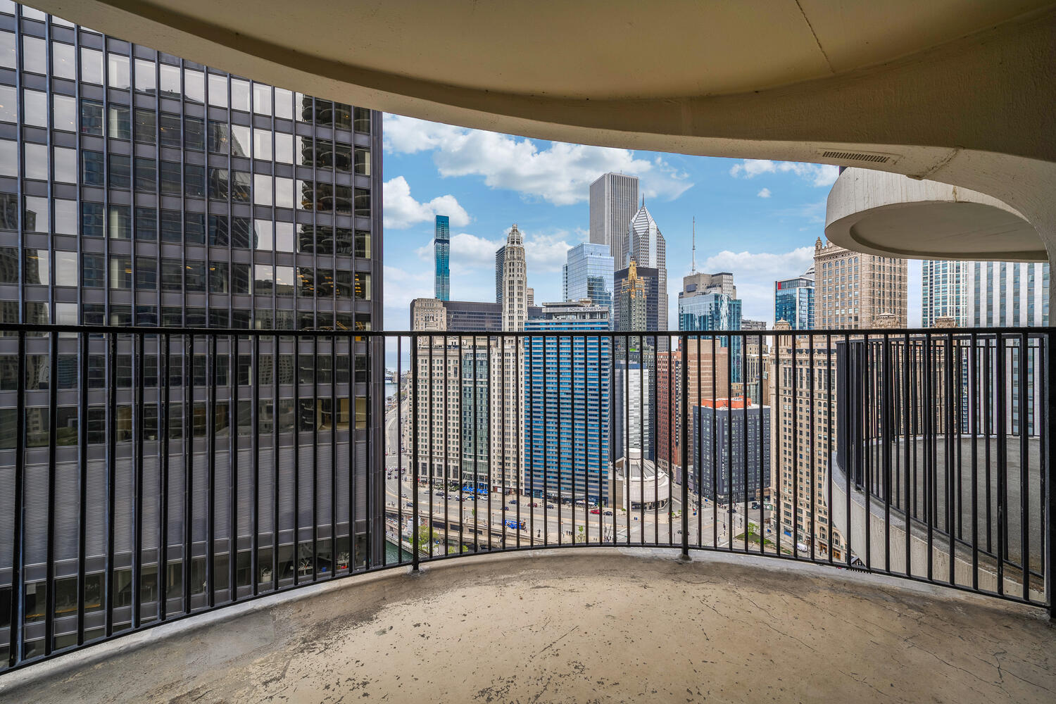 300 North State Street, Unit 3231 Chicago, IL 60654 - Photo 15 of 19 a view of a balcony with a door