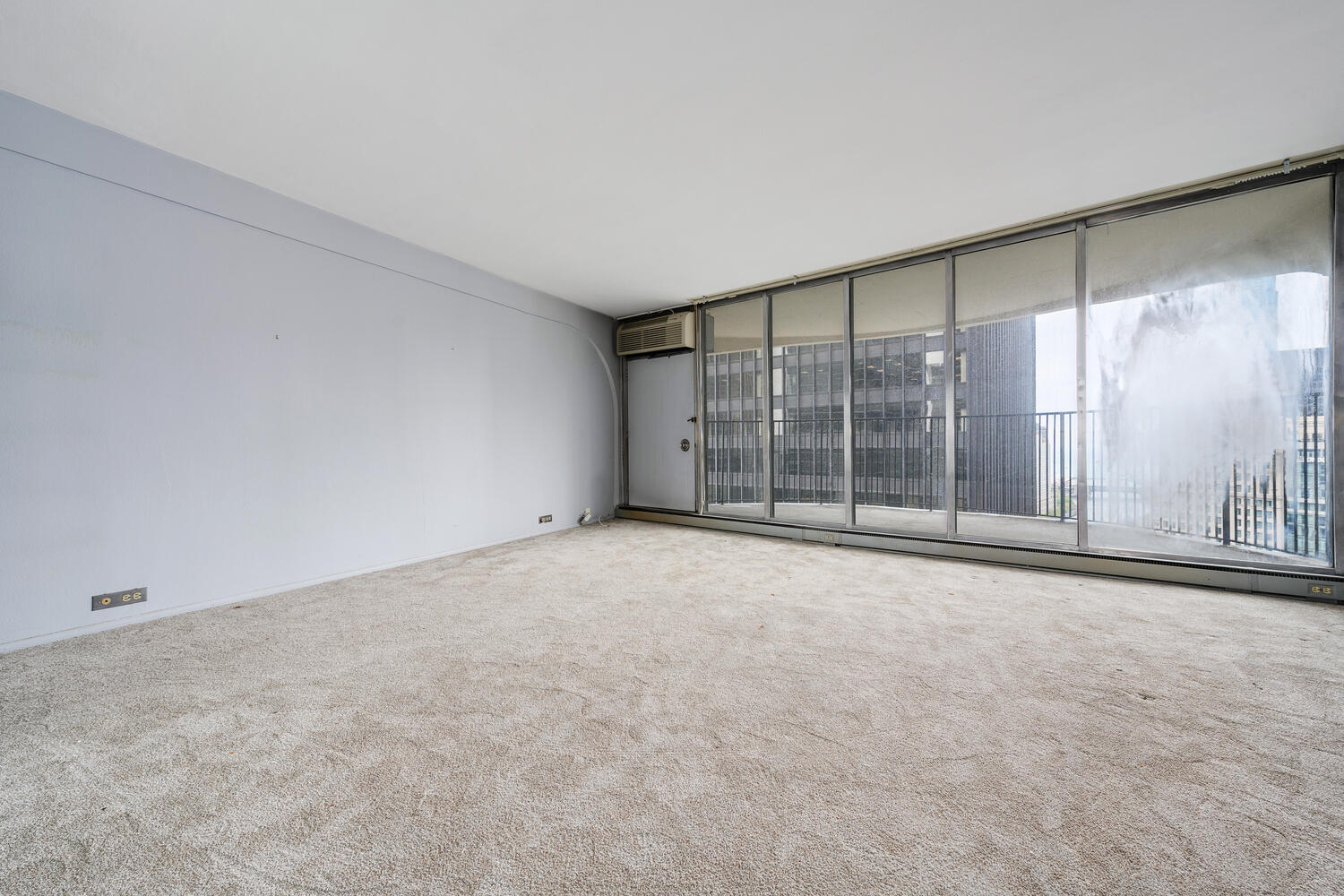 300 North State Street, Unit 3231 Chicago, IL 60654 - Photo 3 of 19 a view of an empty room with a window