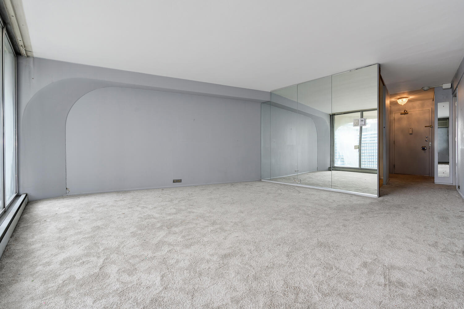 300 North State Street, Unit 3231 Chicago, IL 60654 - Photo 6 of 19 a view of an empty room and window