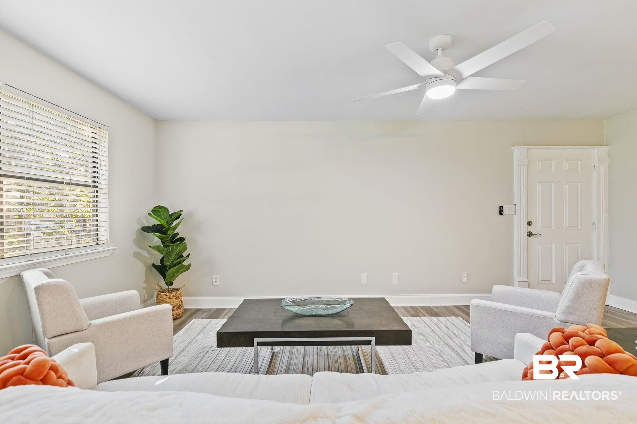 110 5th Street, Unit C103 Daphne, AL 36526 - Photo 11 of 46 Living room with ceiling fan and hardwood / wood-style floors