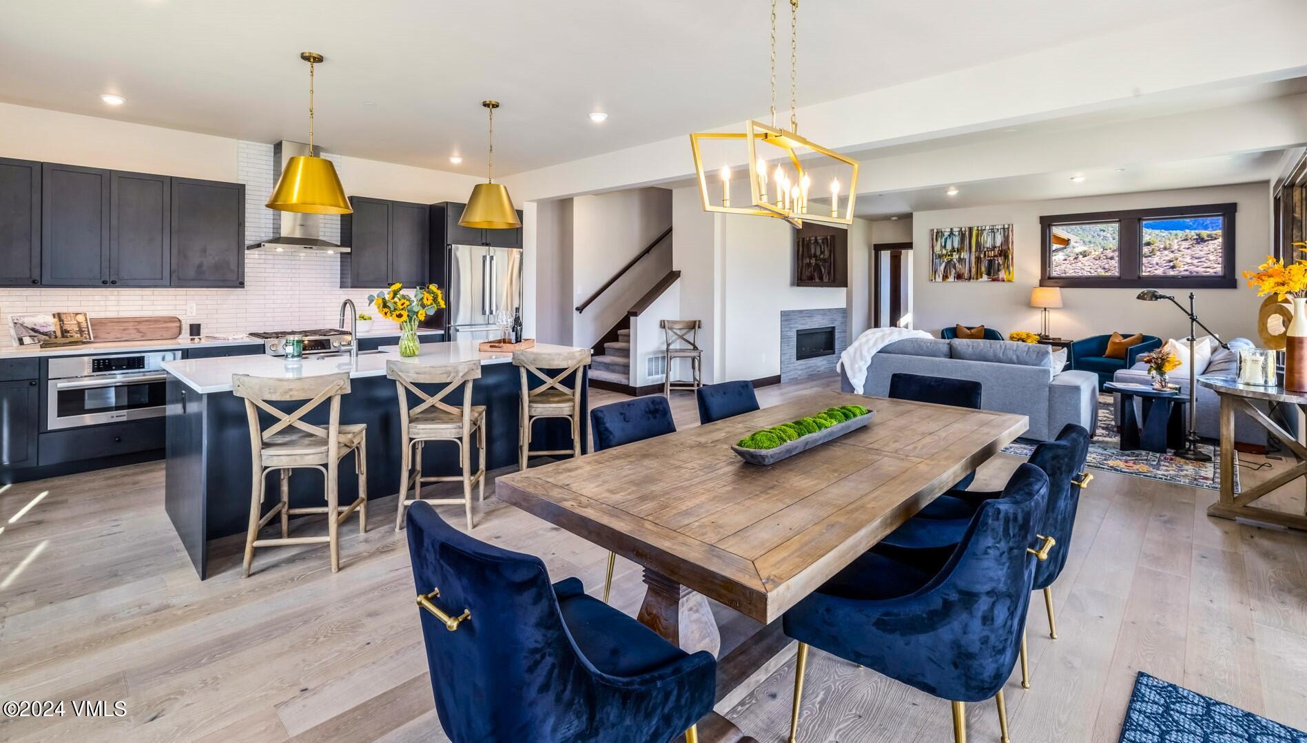 448 Hunters View Lane Eagle, CO 81631 - Photo 14 of 35 a view of a dining area with furniture
