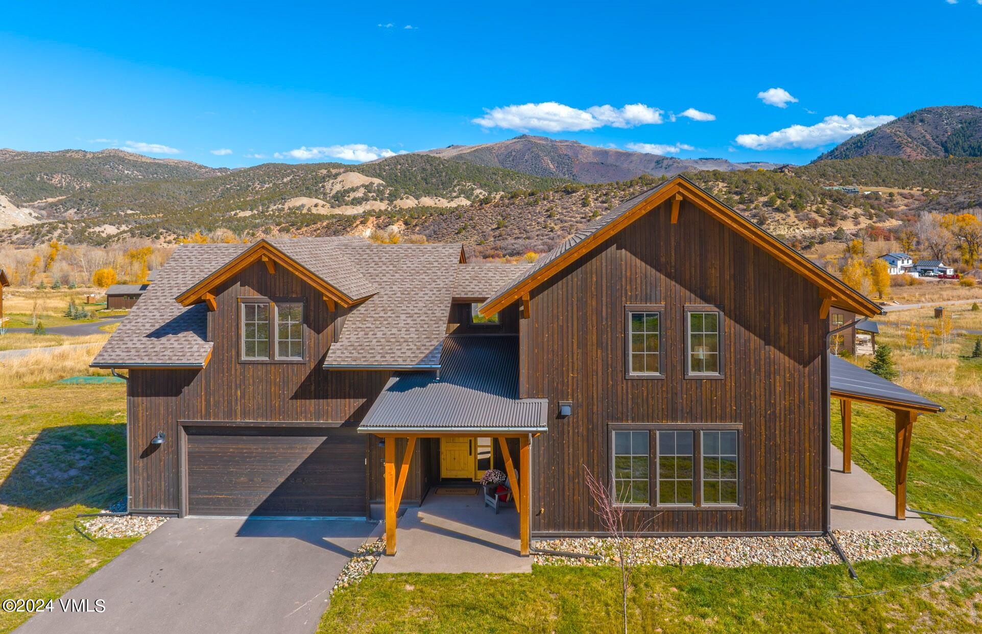 448 Hunters View Lane Eagle, CO 81631 - Photo 31 of 35 a view of a house with a yard