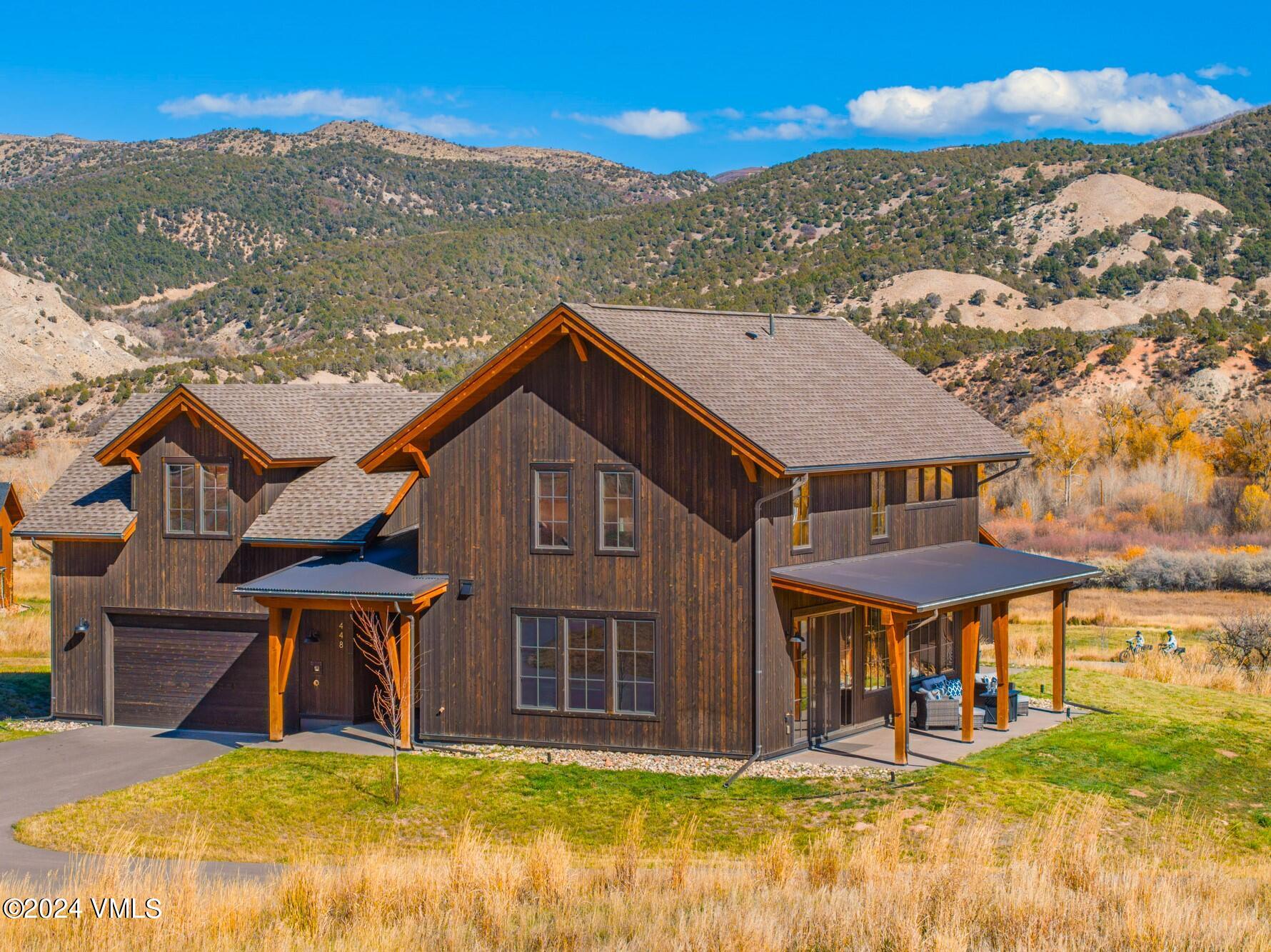 448 Hunters View Lane Eagle, CO 81631 - Photo 32 of 35 a view of a house with a yard