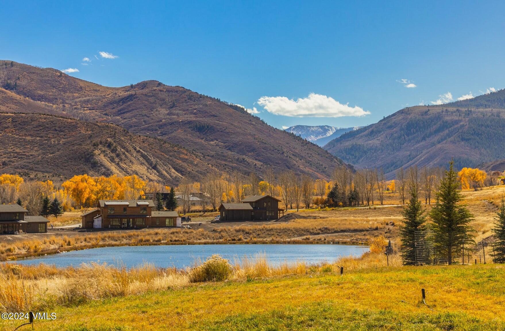 448 Hunters View Lane Eagle, CO 81631 - Photo 5 of 35 a view of a swimming pool with an ocean view