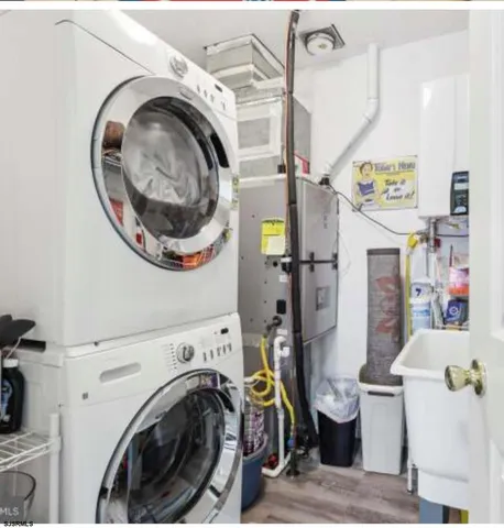 a view of a storage & utility room with washer and dryer