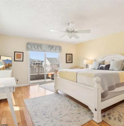 a large white bed in a white room