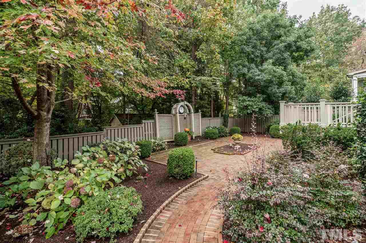 1901 Torrington Street Raleigh, NC 27615 - Photo 28 of 30 a front view of a house with garden