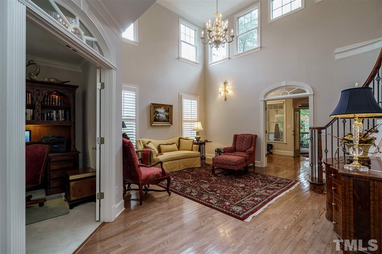 1901 Torrington Street Raleigh, NC 27615 - Photo 4 of 30 a living room with furniture or outdoor dining table and a window