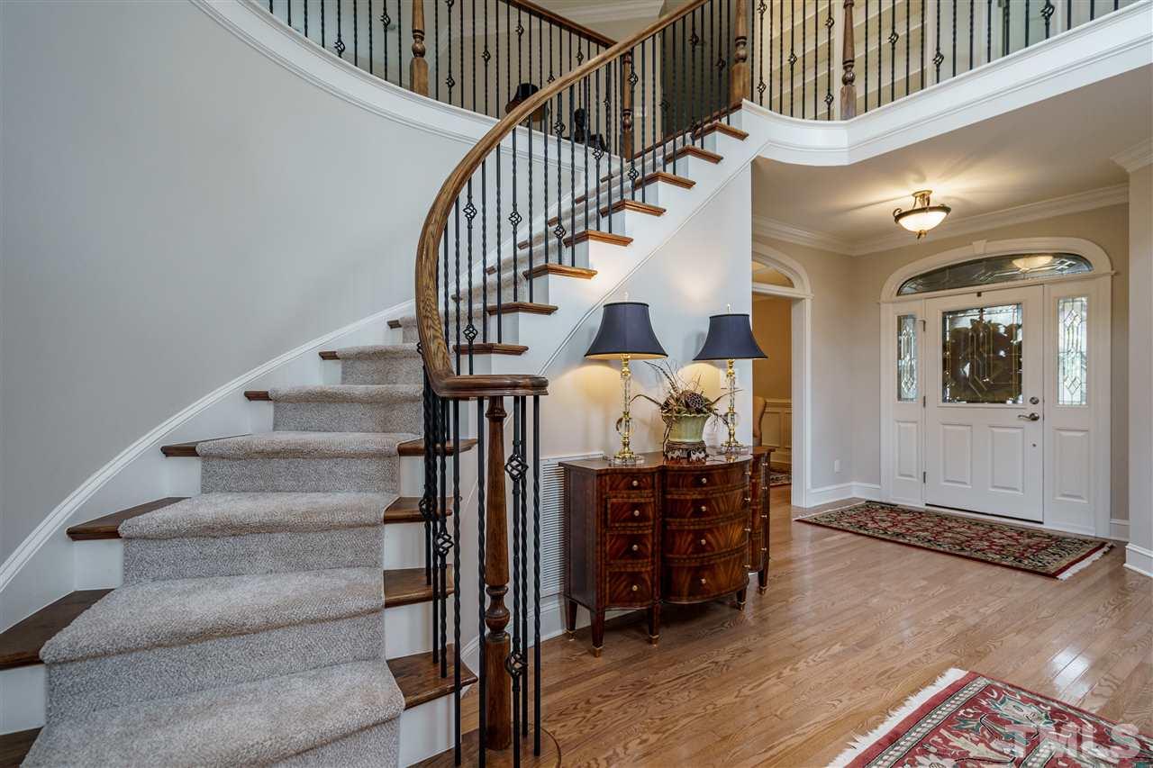 1901 Torrington Street Raleigh, NC 27615 - Photo 5 of 30 a view of entryway bedroom and hall with wooden floor