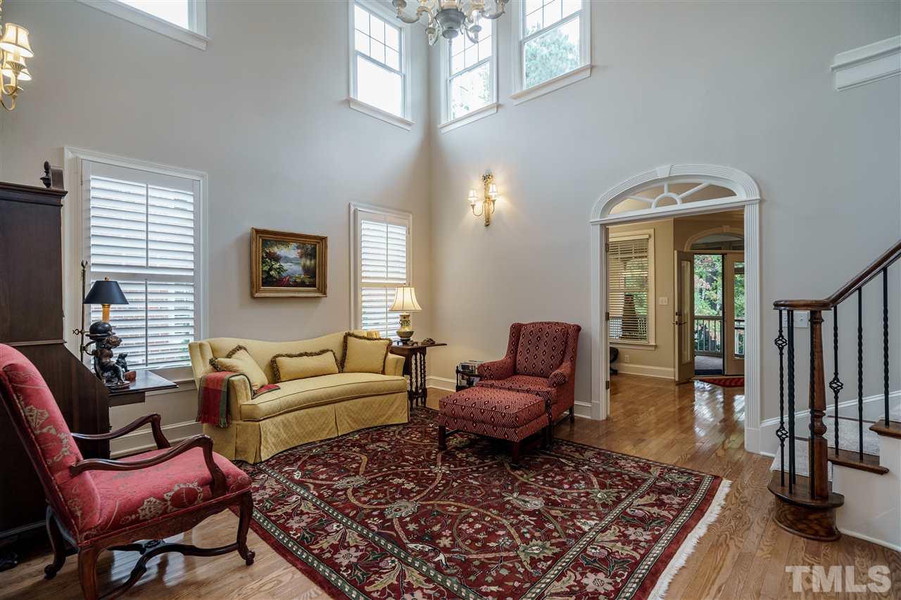 1901 Torrington Street Raleigh, NC 27615 - Photo 7 of 30 a living room with furniture and a rug
