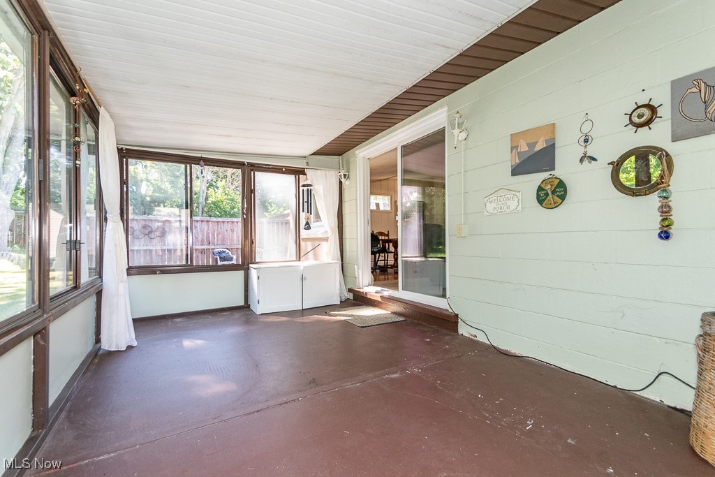 6533 Coleridge Road Painesville, OH 44077 - Photo 14 of 24 View of unfurnished sunroom