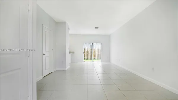 a view of an empty room with window