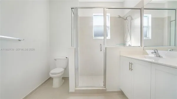 a view of a backyard with a chair