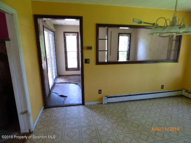 1957 Mack Road Kingsley, PA 18826 - Photo 11 of 31 a view of an empty room with windows