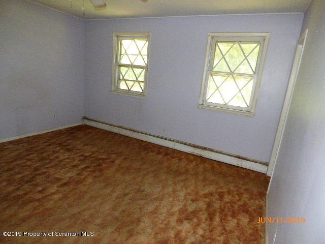 1957 Mack Road Kingsley, PA 18826 - Photo 17 of 31 an empty room with windows