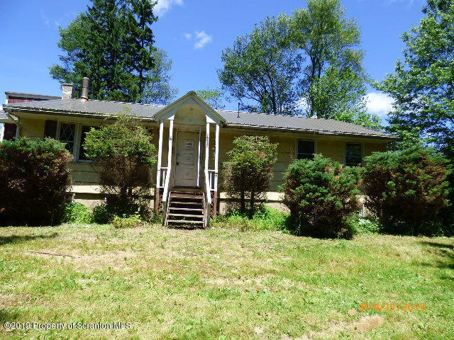 1957 Mack Road Kingsley, PA 18826 - Photo 2 of 31 a view of a house with backyard and a garden