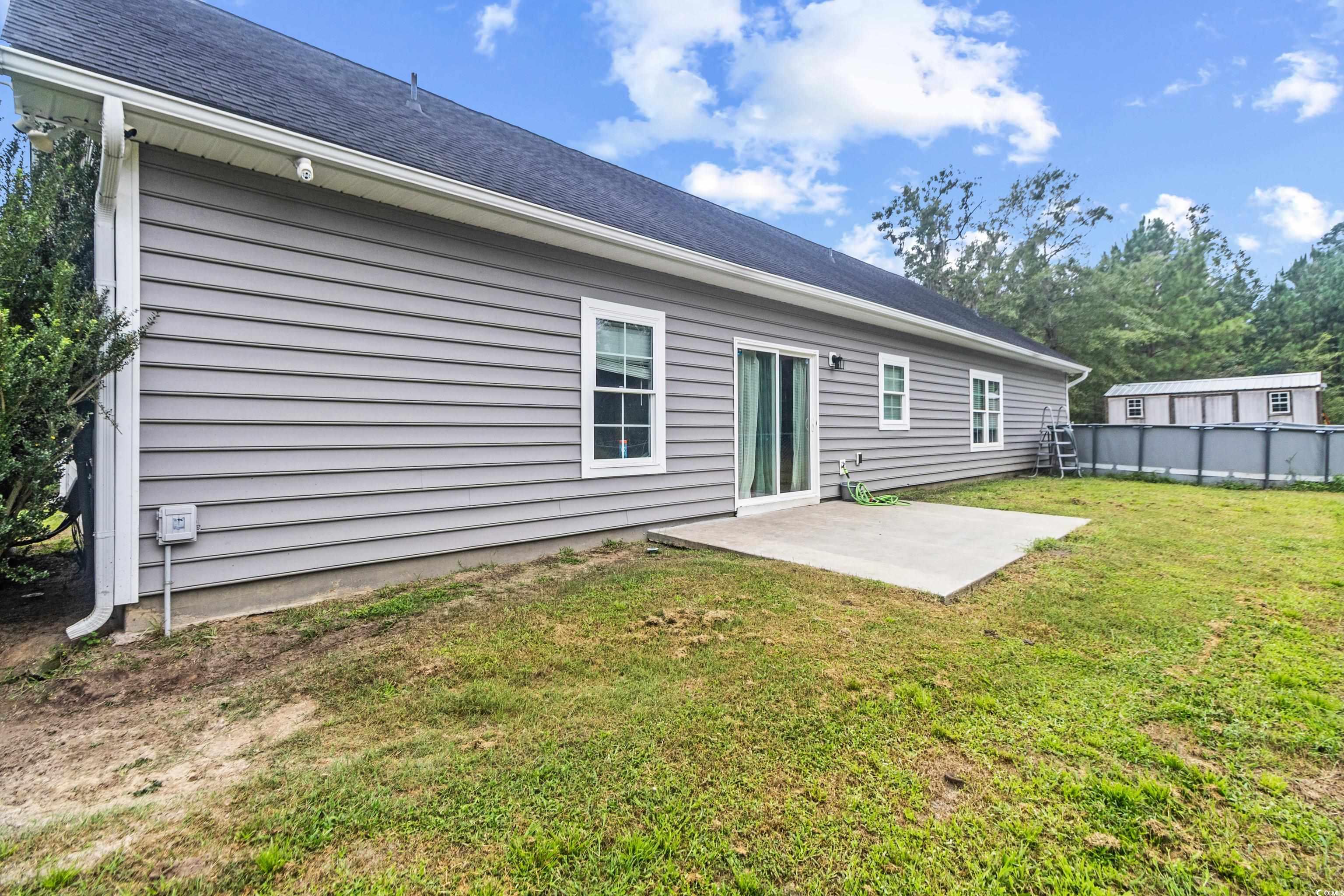 4867 Wolf Trail Conway, SC 29527 - Photo 22 of 31 Spare room with dark wood finished floors and a ceiling fan