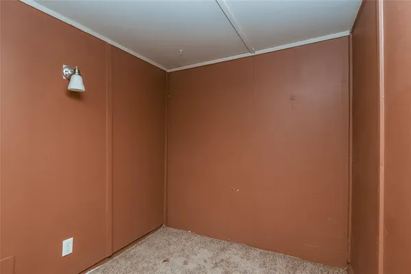 a bathroom with a sink toilet and mirror