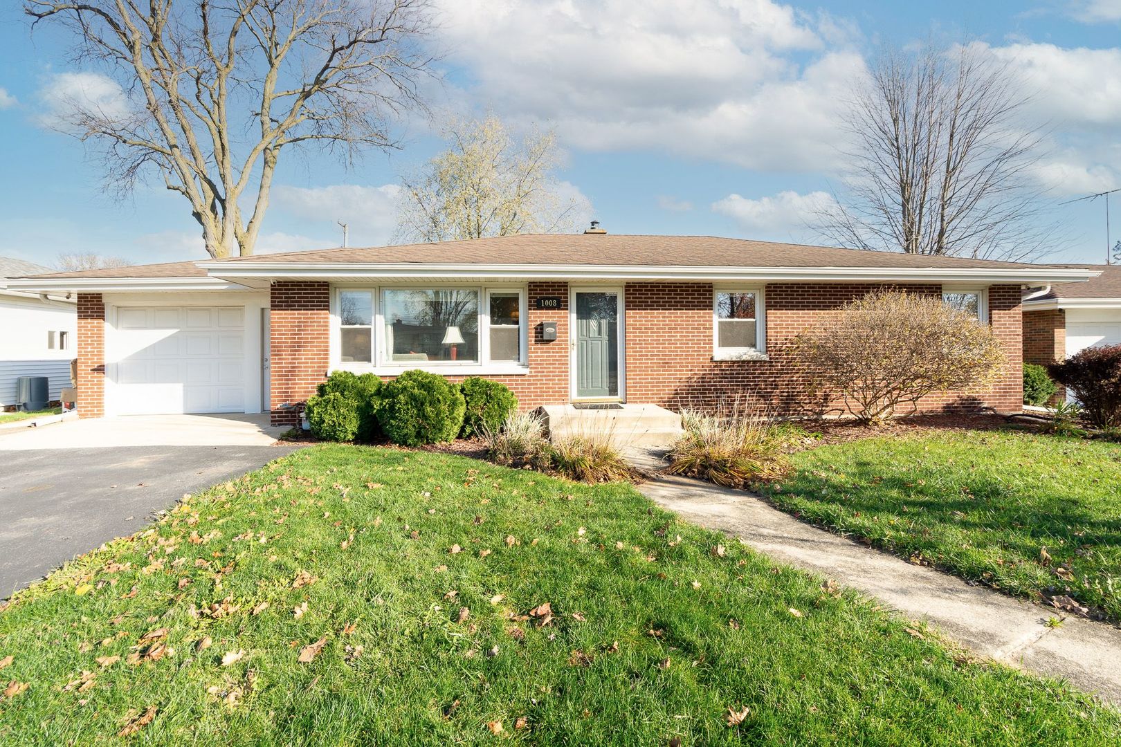 1008 Westminster Road Joliet, IL 60435 - Photo 1 of 28 a front view of house with yard and green space