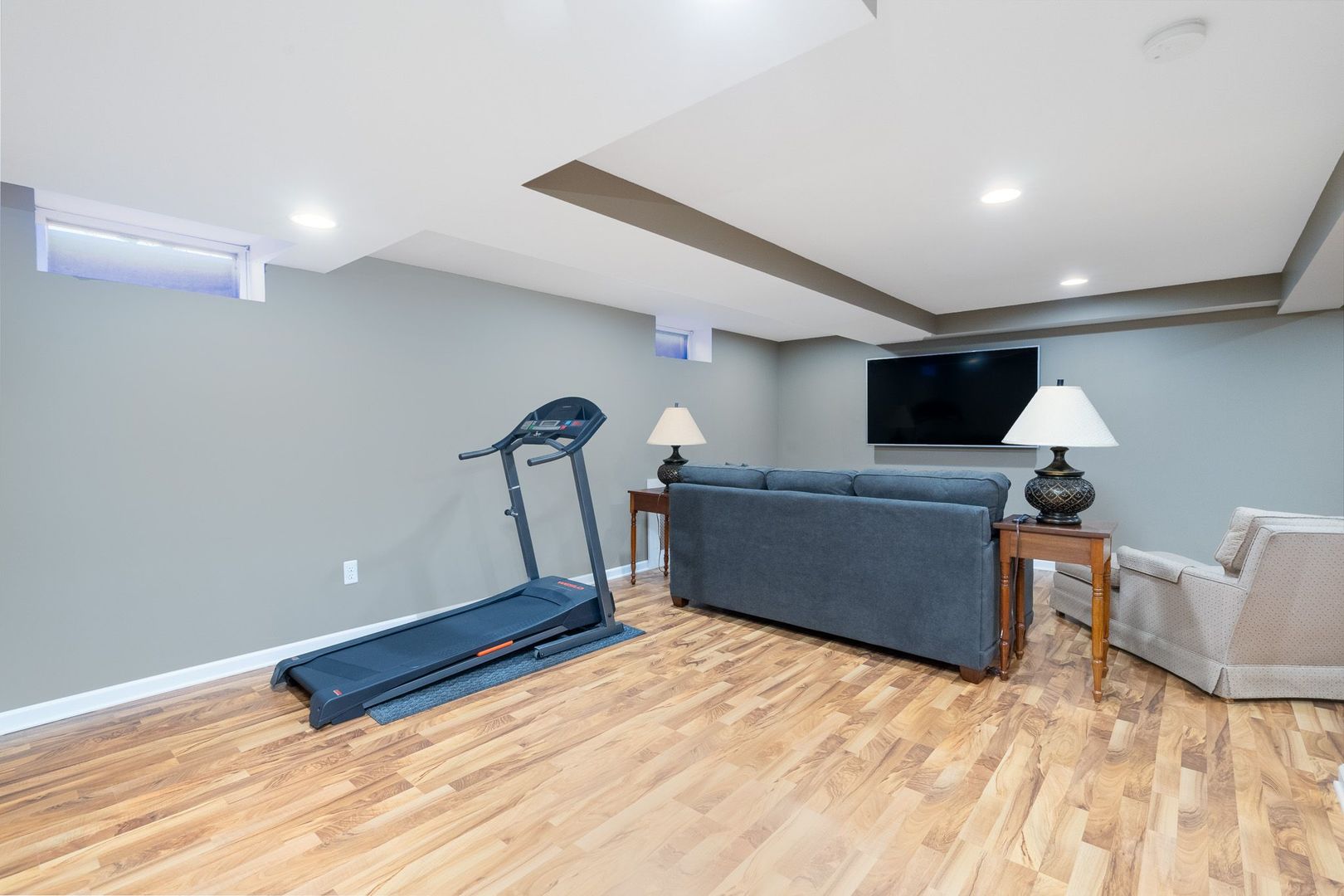 1008 Westminster Road Joliet, IL 60435 - Photo 18 of 28 a room with gym equipment and wooden floor