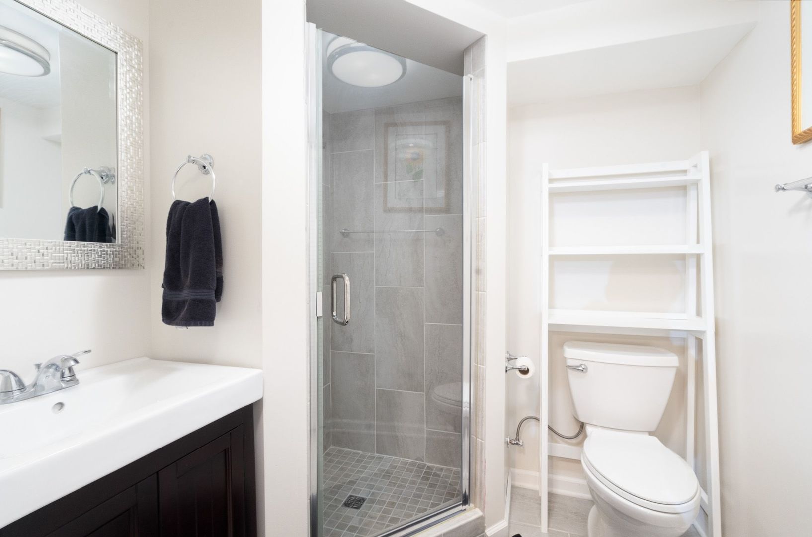 1008 Westminster Road Joliet, IL 60435 - Photo 21 of 28 a bathroom with a toilet a sink and mirror