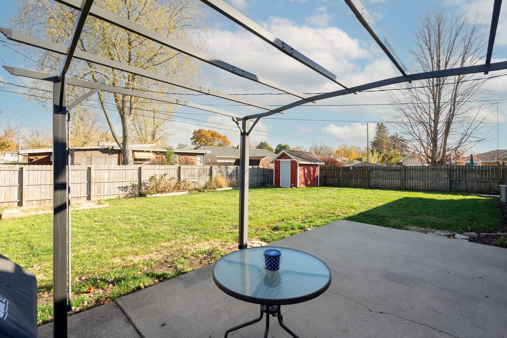 1008 Westminster Road Joliet, IL 60435 - Photo 26 of 28 a view of a garden with a slide