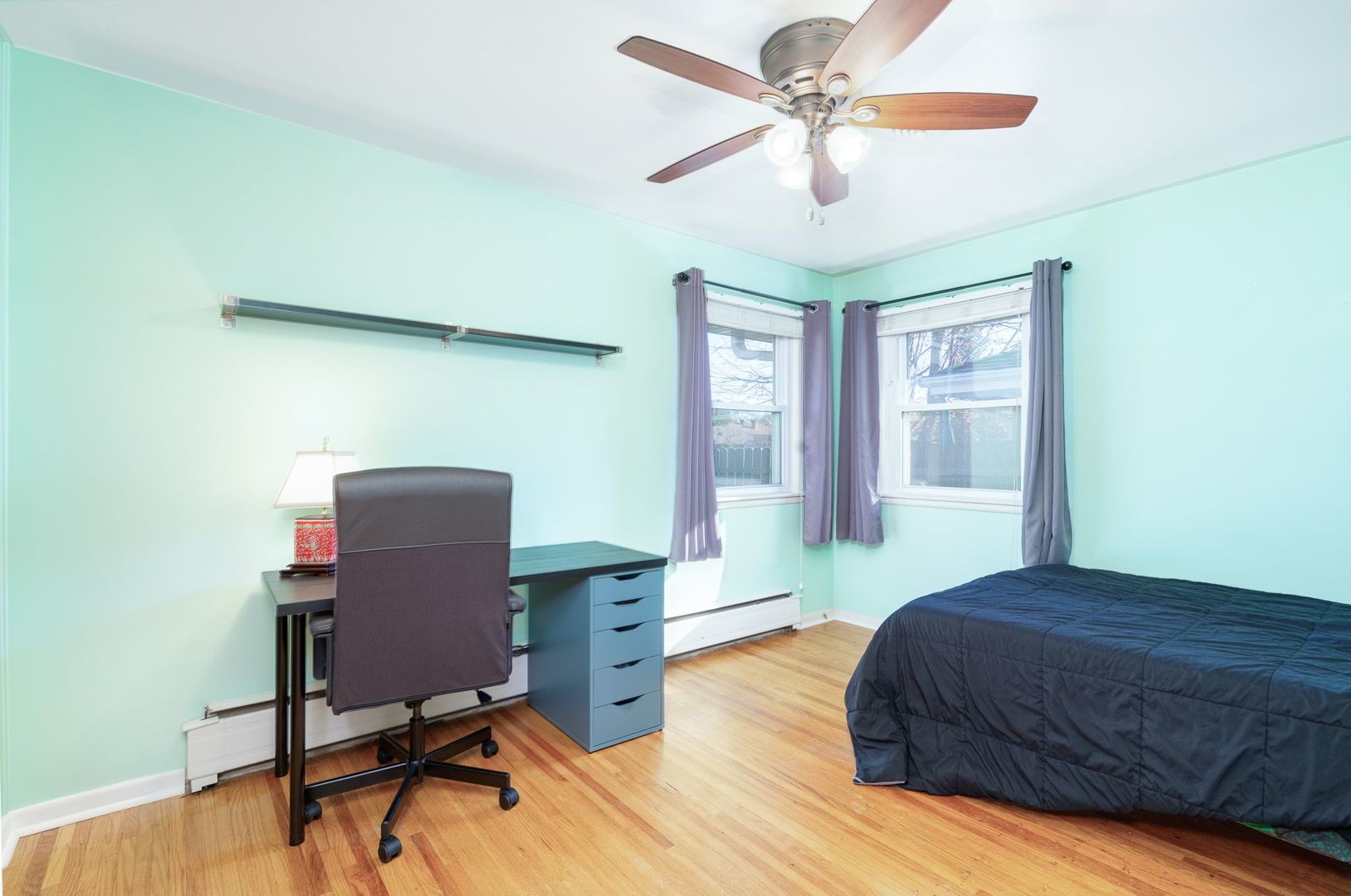 1008 Westminster Road Joliet, IL 60435 - Photo 10 of 28 a bedroom with a bed window and a desk